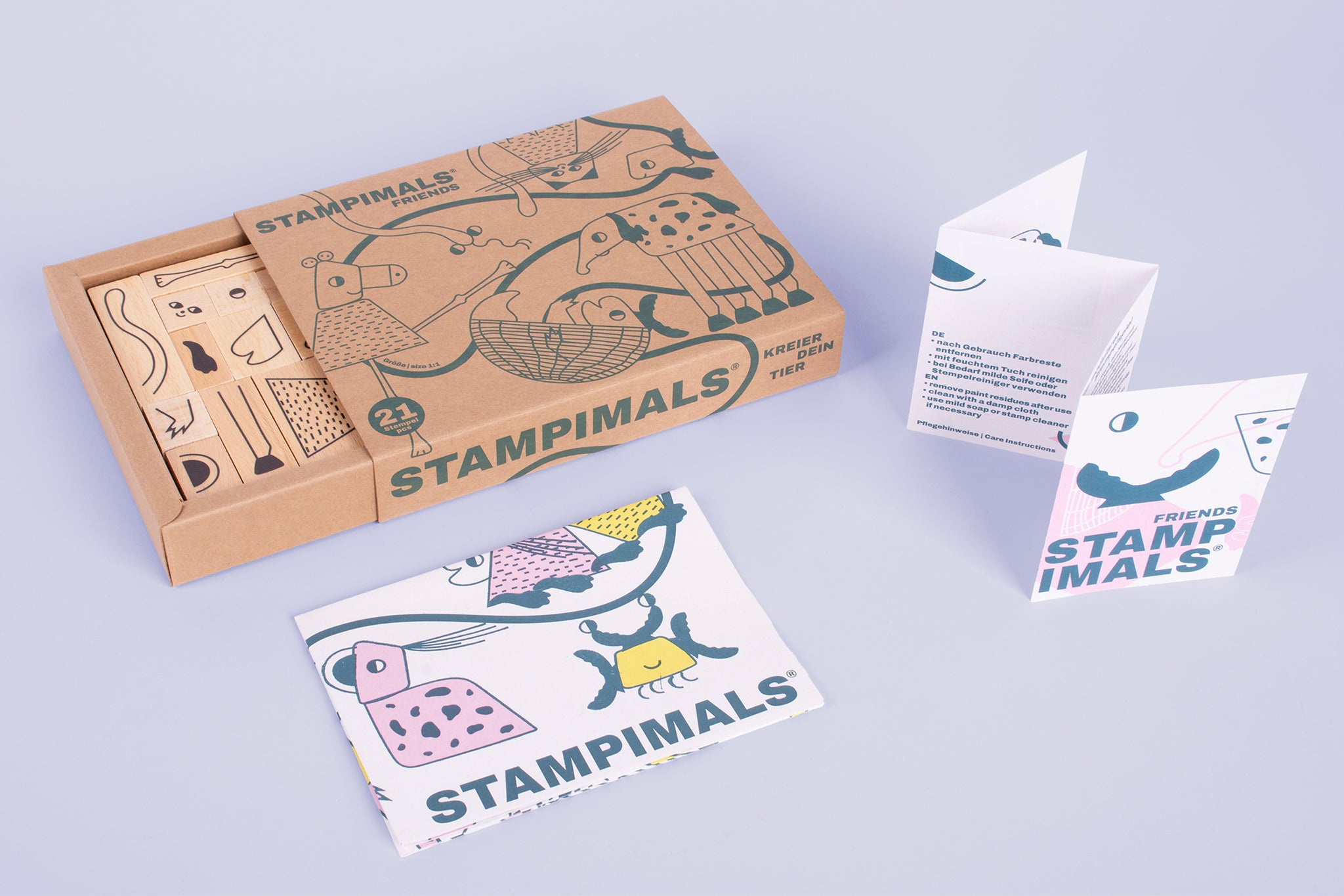 Stempelset ausgepackt mit Poster und Anleitung.